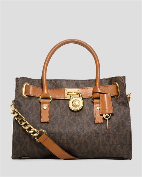 michael kors hamilton east west brown logo satchel handbag|Michael Kors Hamilton legacy large.